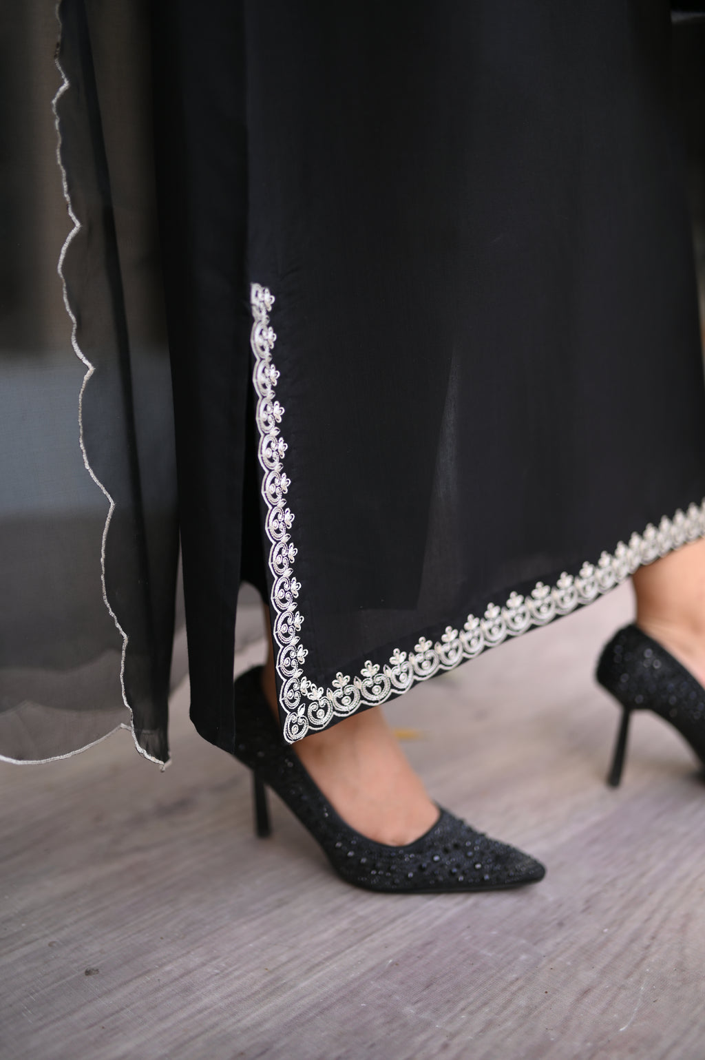 Noiré neckline and sleeve embroidery detail in black blended silk by ARSHAÉ