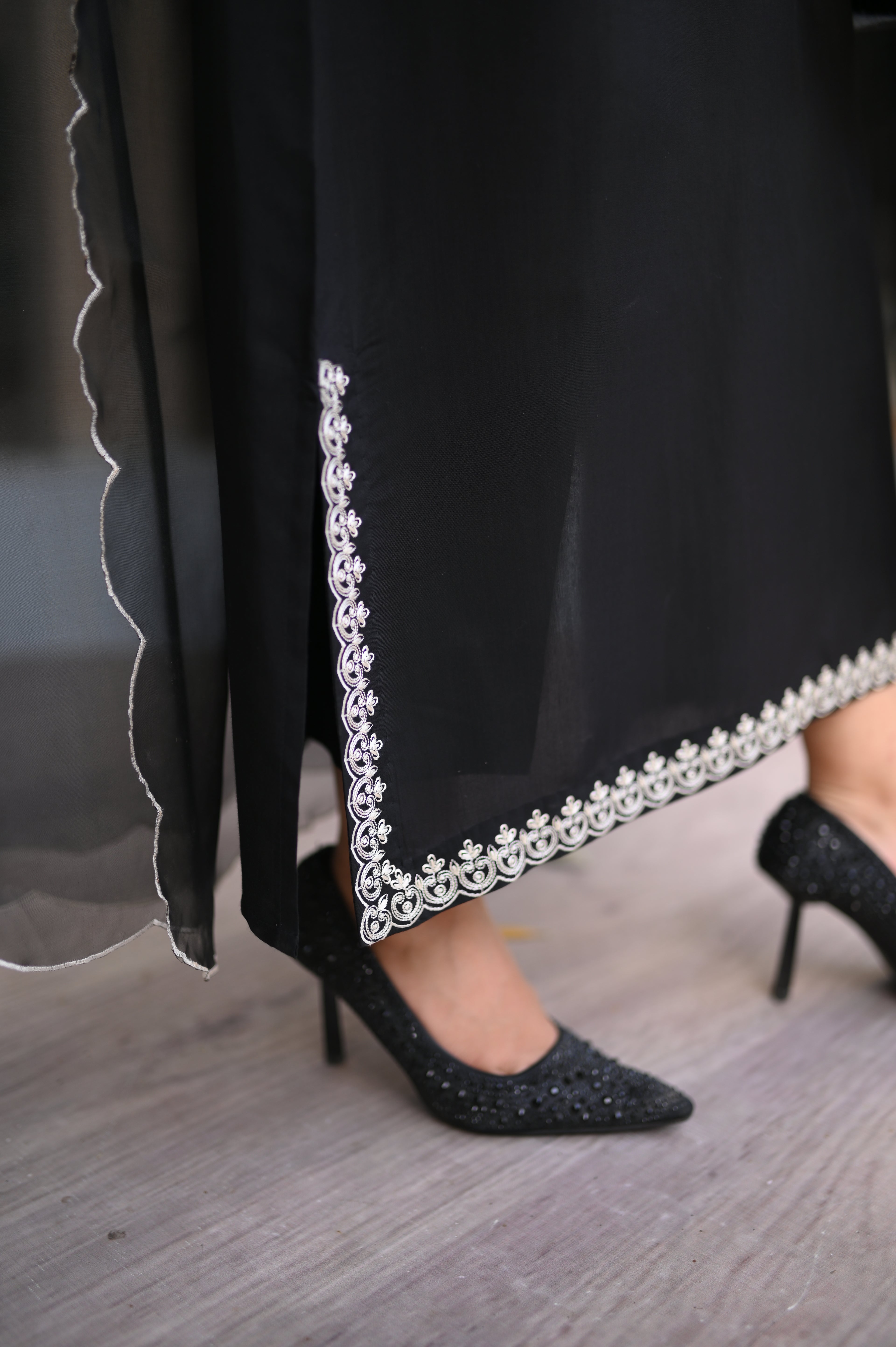 Noiré neckline and sleeve embroidery detail in black blended silk by ARSHAÉ